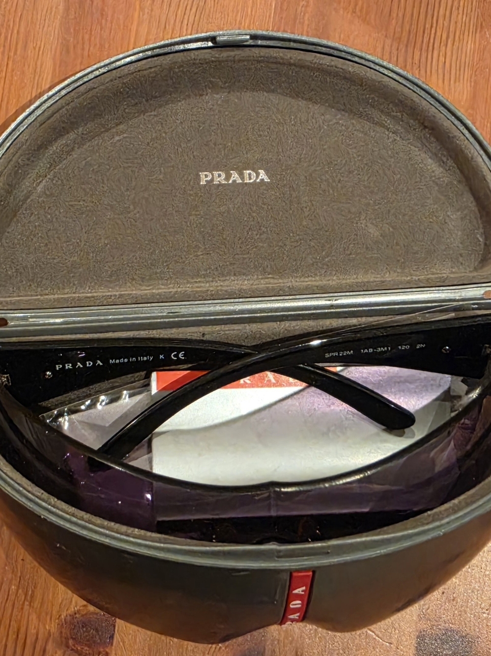Prada Men’s Black Frames with Purple Gradient Lenses